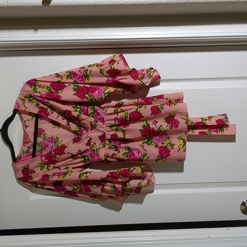 Betsey Johnson blouse. V neck, ties in back. Size M. Pink floral.
